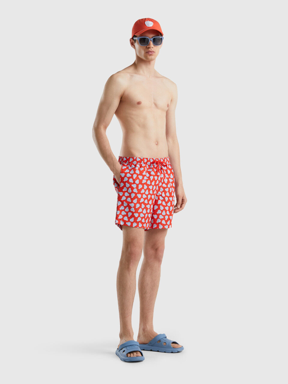 Red swim trunks with pear pattern
