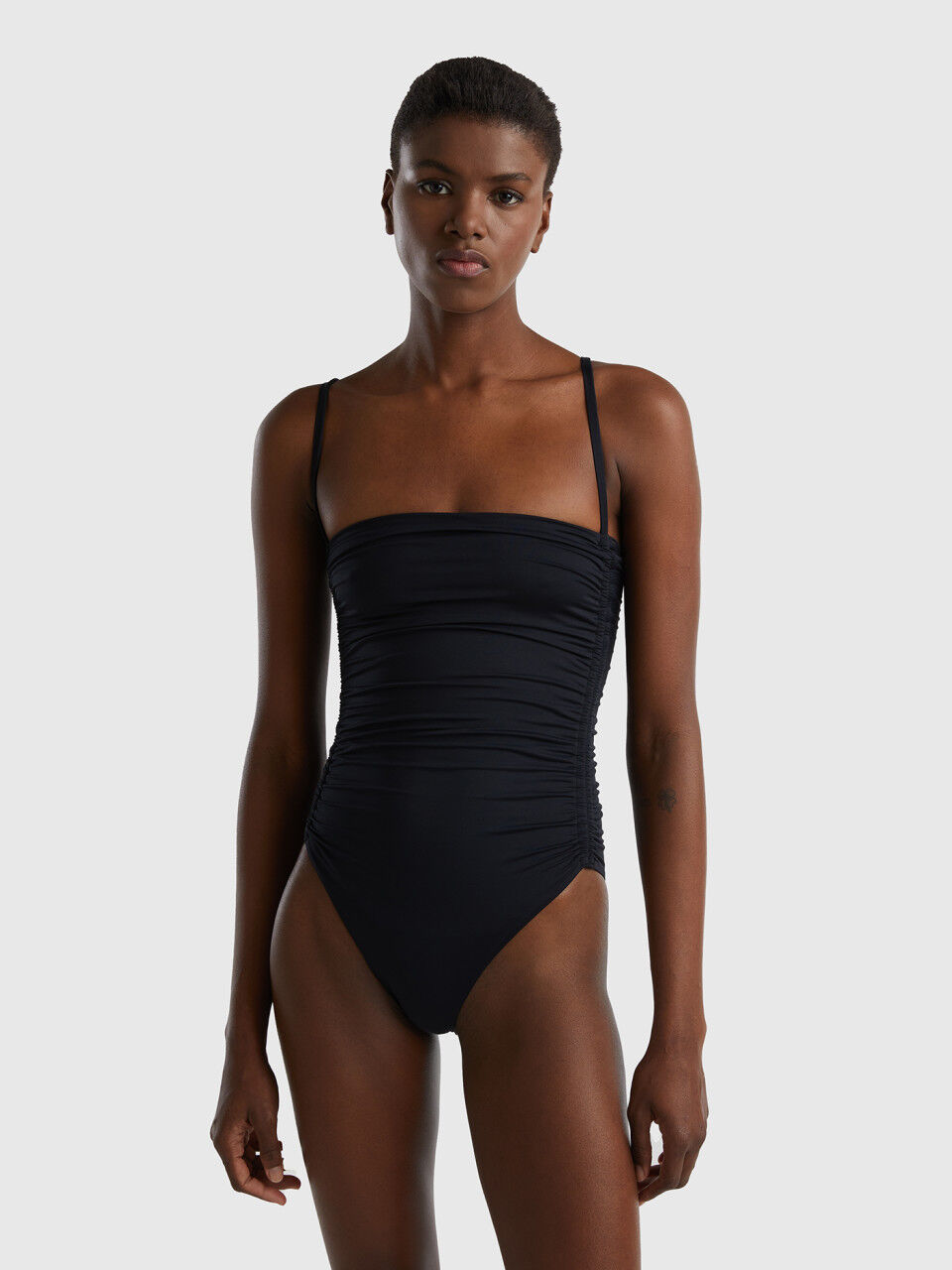 One-piece swimsuit in ECONYL® with draping