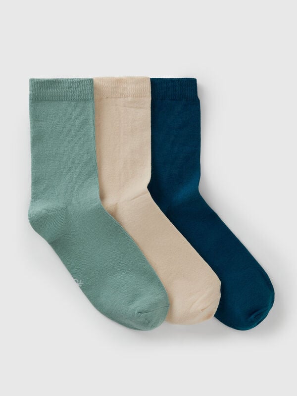 Three pairs of long stretch cotton socks