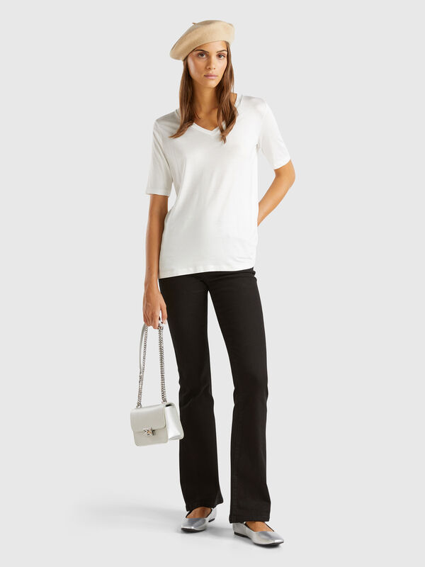 Flared jeans in recycled cotton blend Women