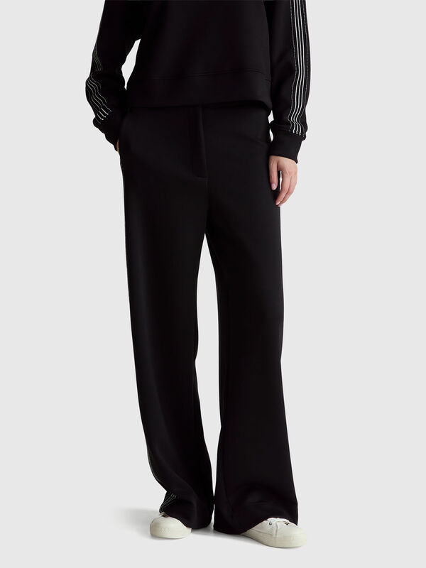 Wide trousers with side stripes Women