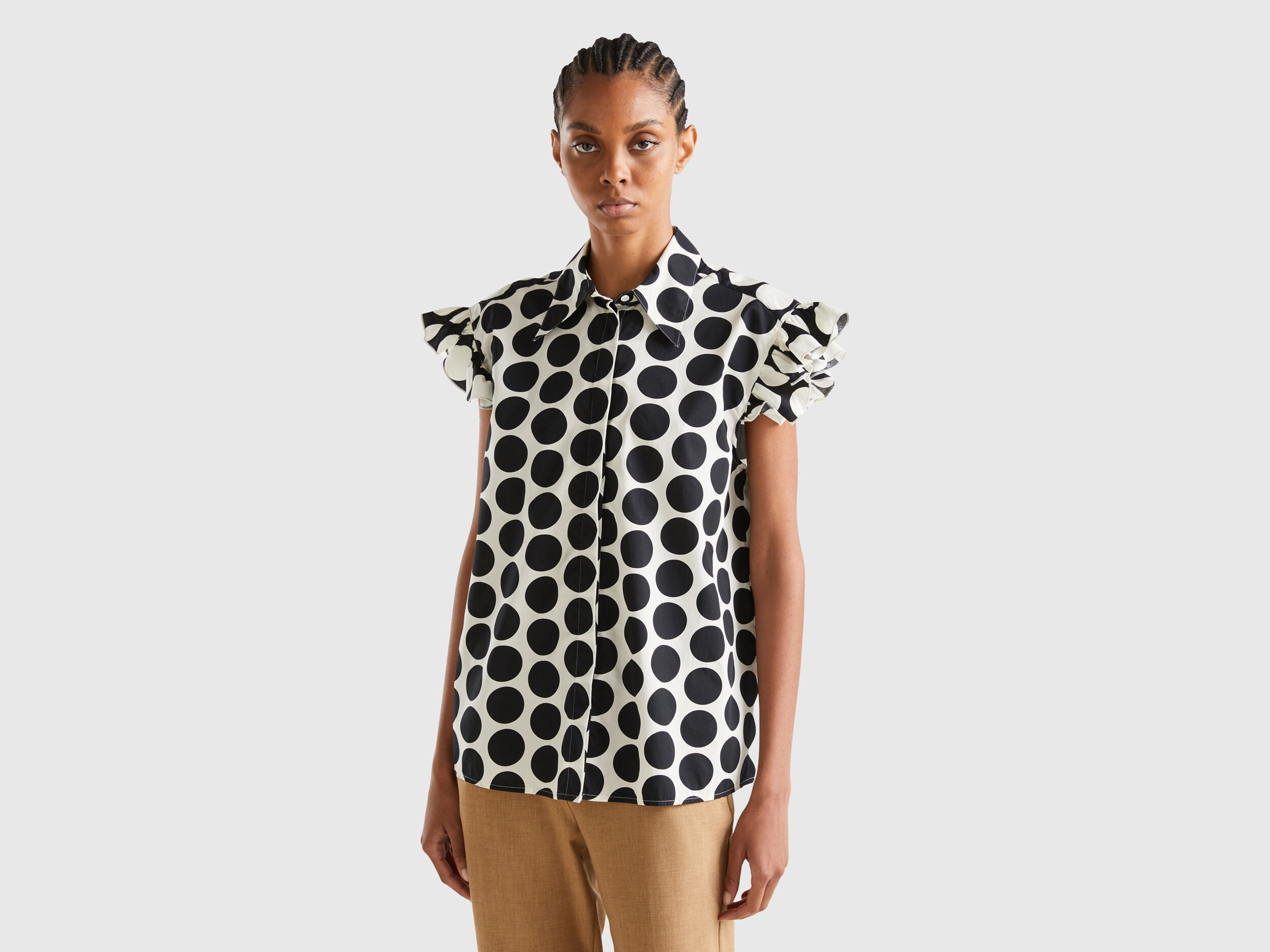 Sleeveless polka dot shirt Black Benetton
