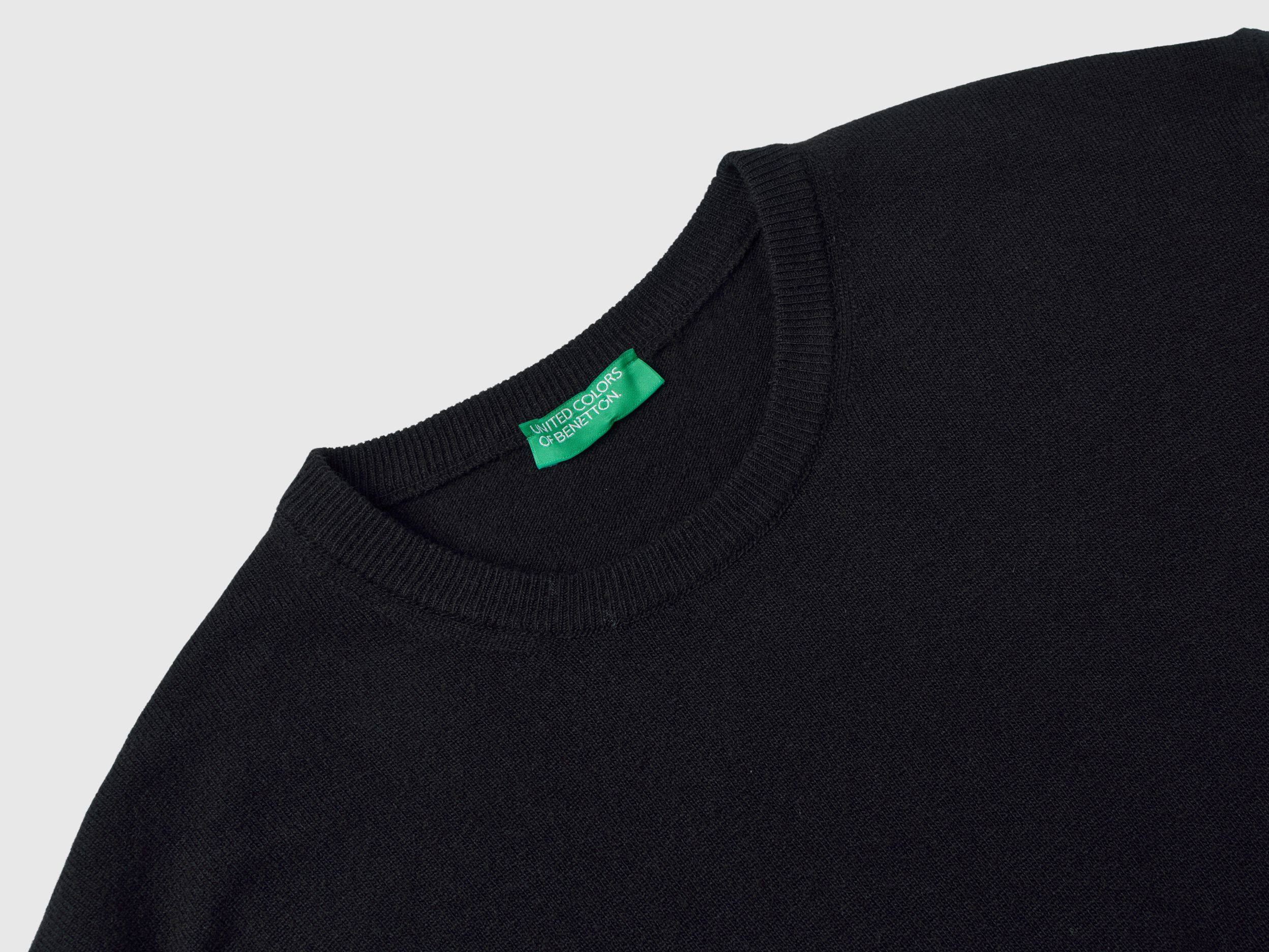 Black crew neck sweater in pure Merino wool Black Benetton
